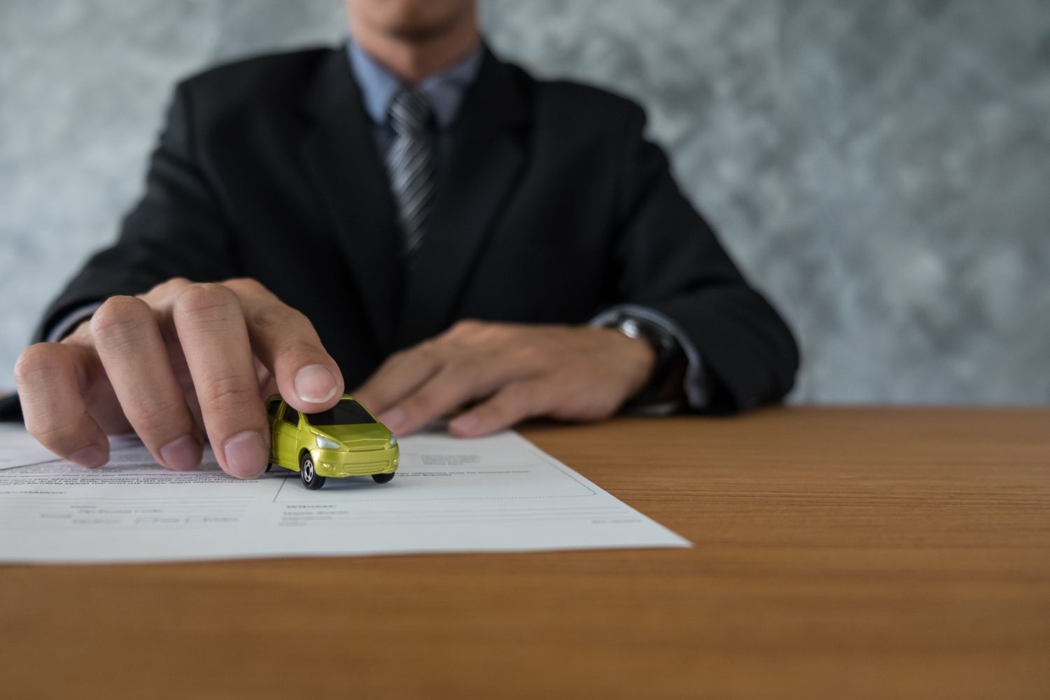 transportation-ownership-concept-customer-salesman-with-car-key get in touch with us