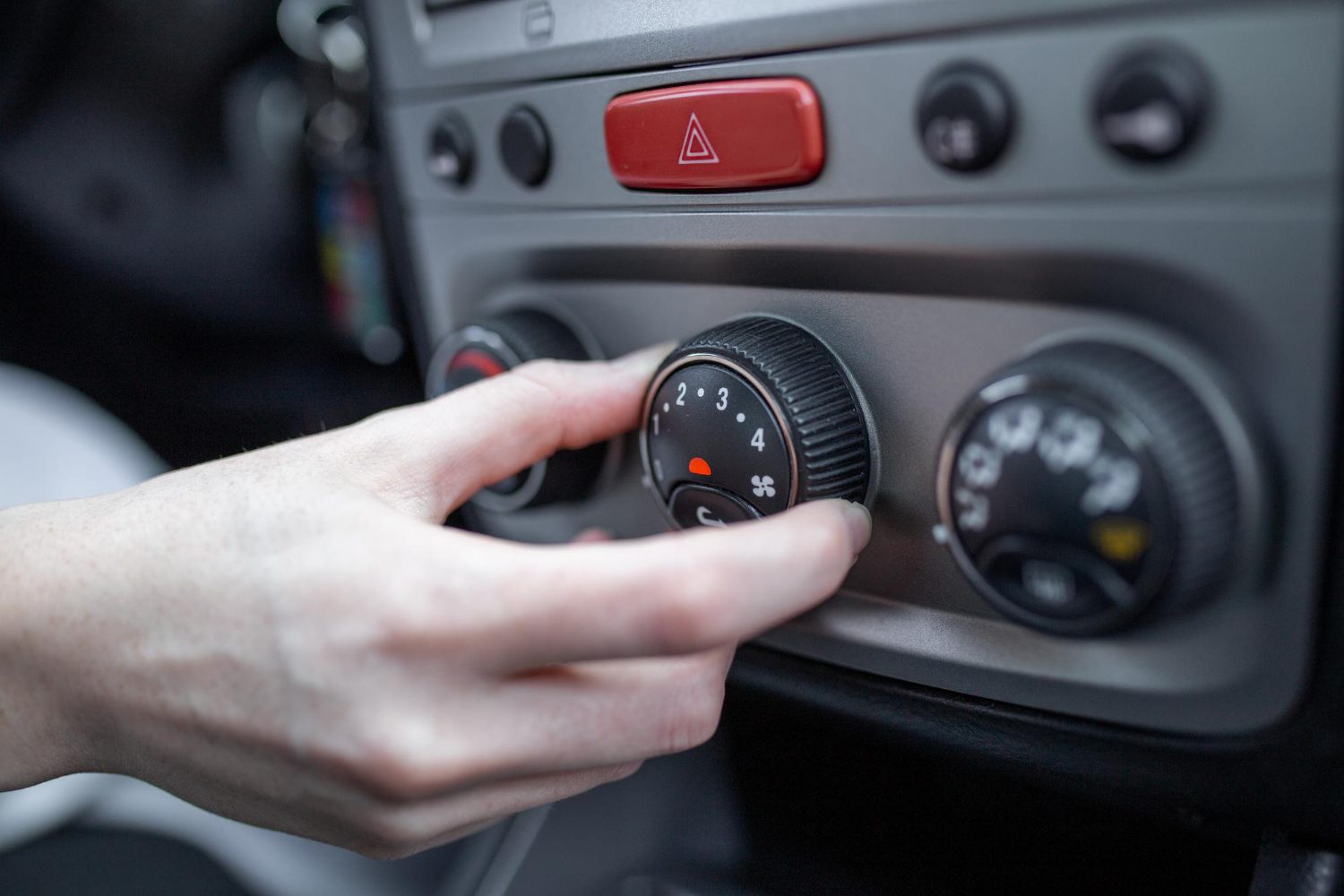 woman-hand-turning-car-air-conditioning-system-car-air-conditioner-off-button-close-up-view get in touch with us